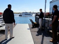 1008280152 ma nb NantucketFerry  Seastreak representatives look on as fast ferry casts off on its maiden voyage from New Bedford to Nantucket.   PETER PEREIRA/THE STANDARD-TIMES/SCMG : ferry, waterfront, voyage, trip, harbor